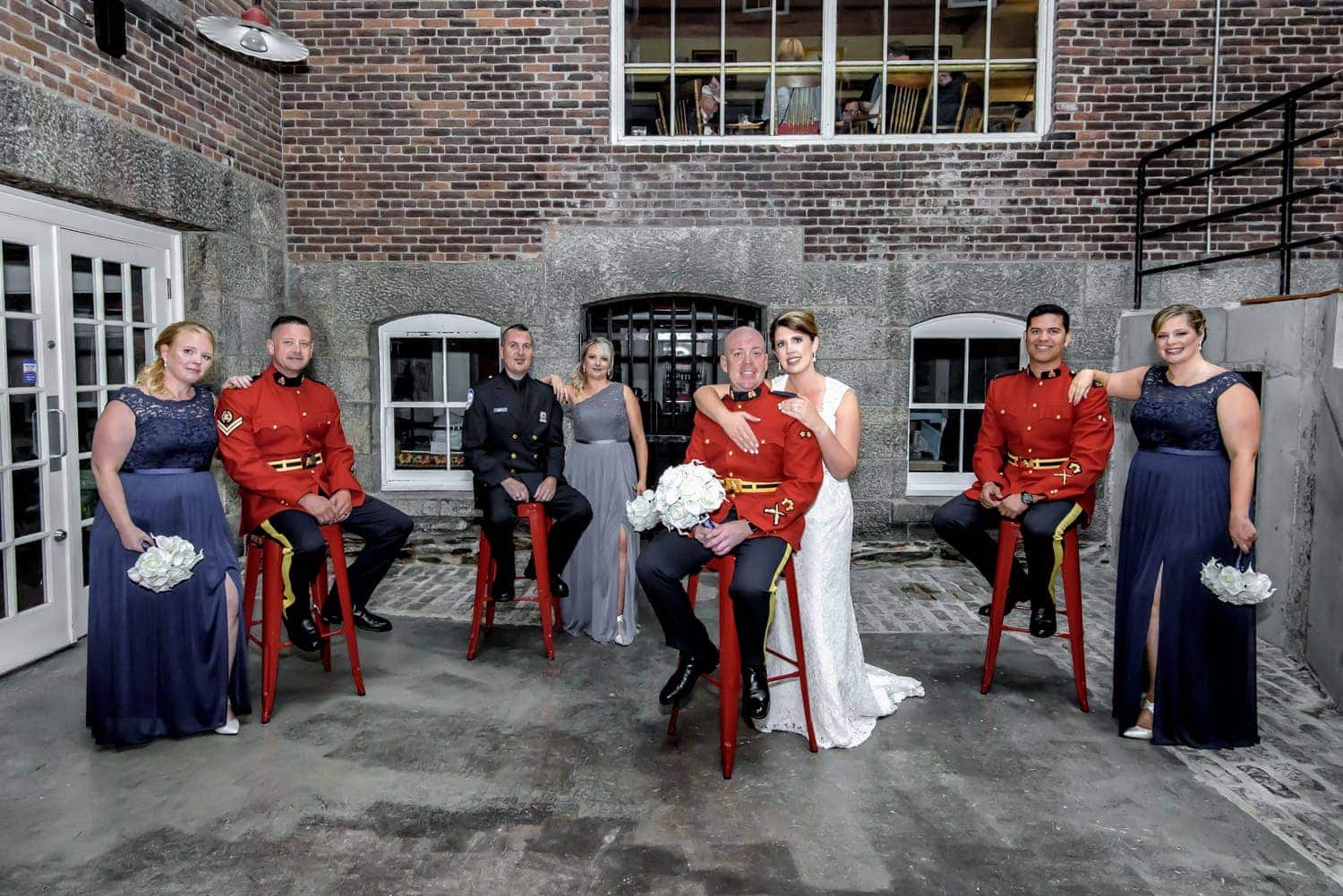 RCMP groom with bride and wedding party photos at Alexander Keiths Brewey in Halifax.