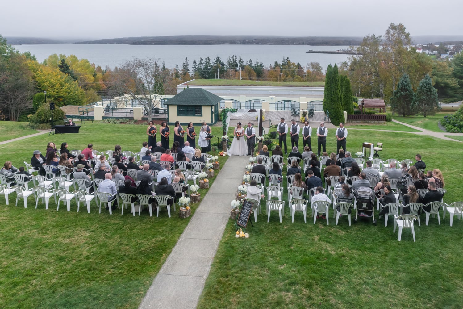 An aerial view of the bride and groom's wedding ceremony outside at Digby Pines.