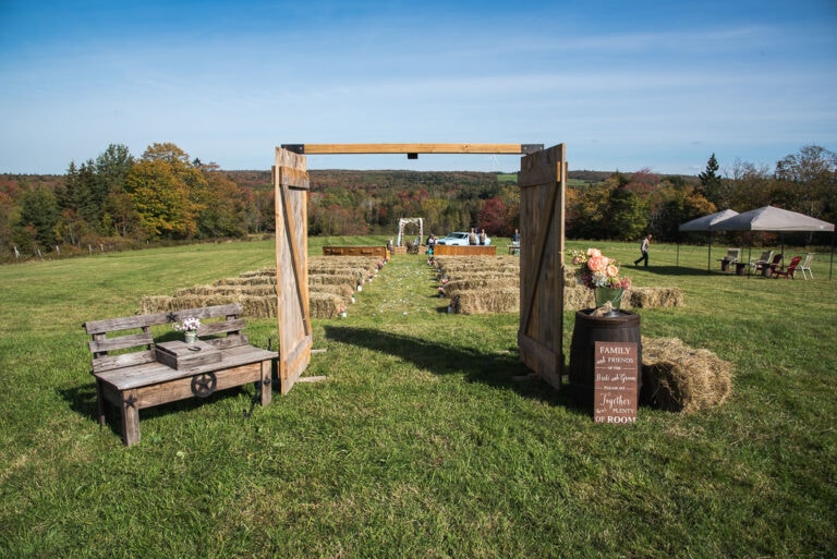 Backyard rustic barn style wedding ceremony set up in Truro NS.
