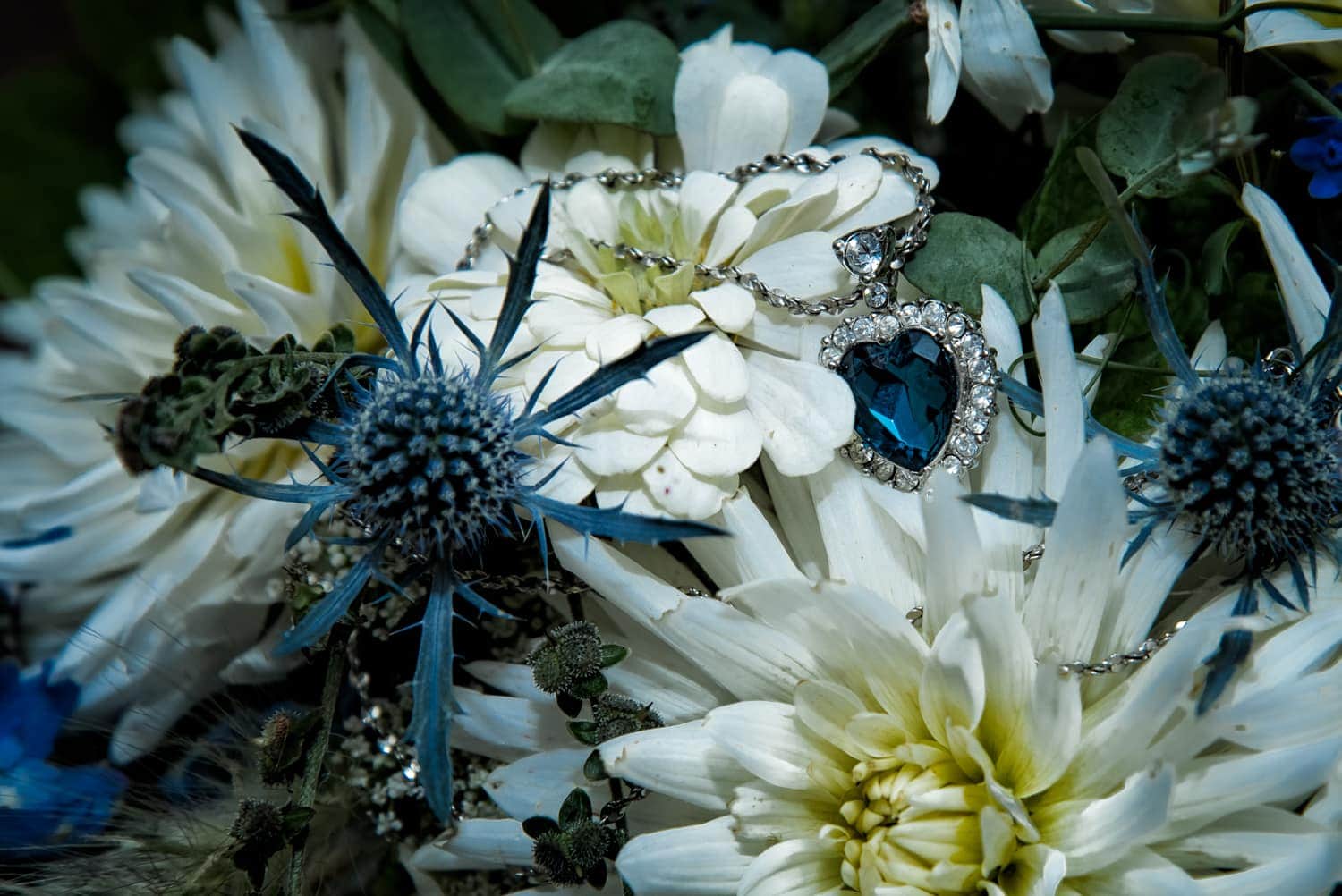 A beautiful wild flower style navy and ivory wedding bridal bouquet.