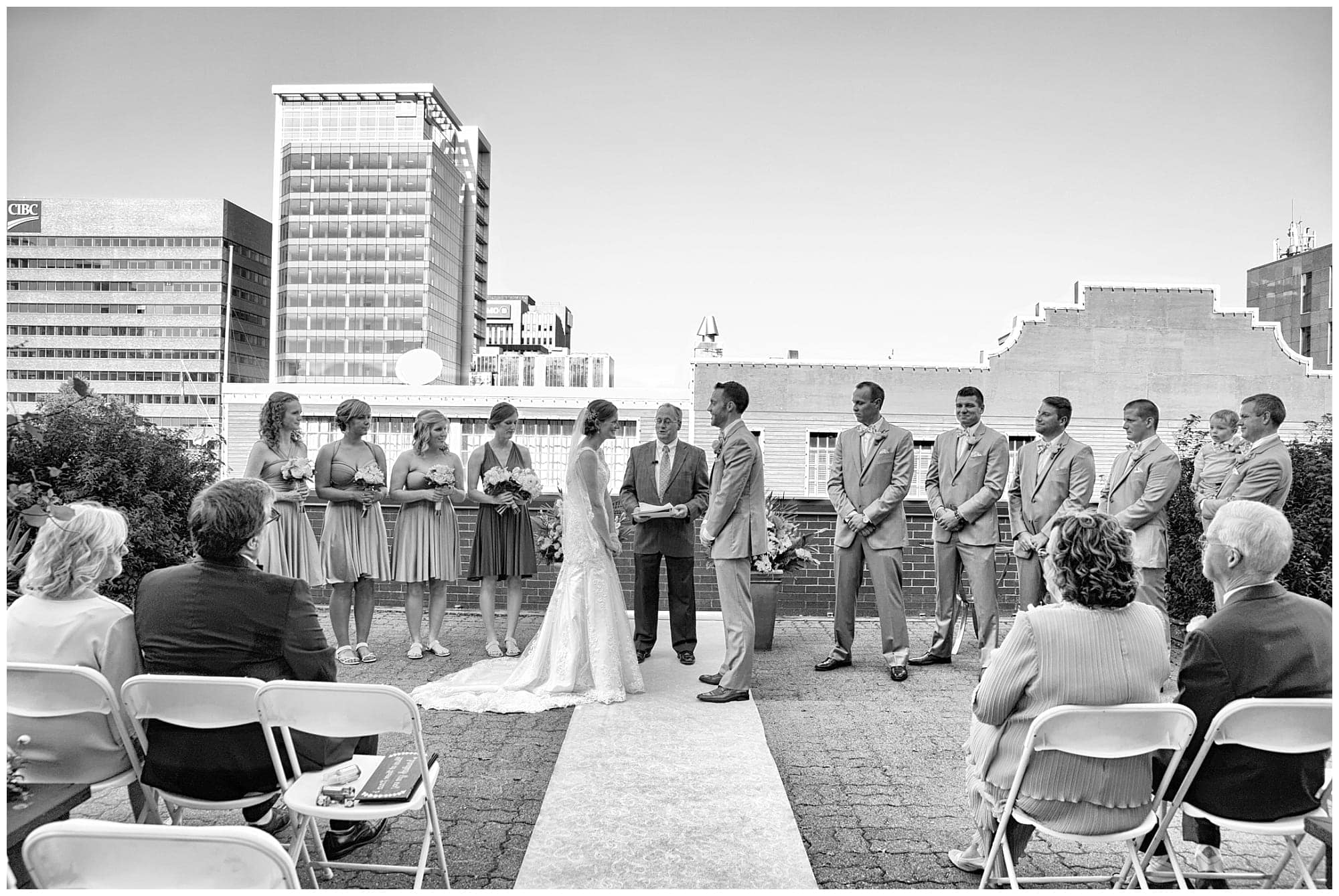 The bride and groom's wedding ceremony on the balcony at the Prince George Hotel in Halifax.