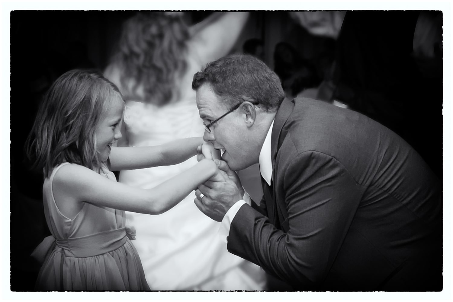 The groom dances with his daughter during his wedding reception at the Ashburn Golf Club in Halifax, NS.