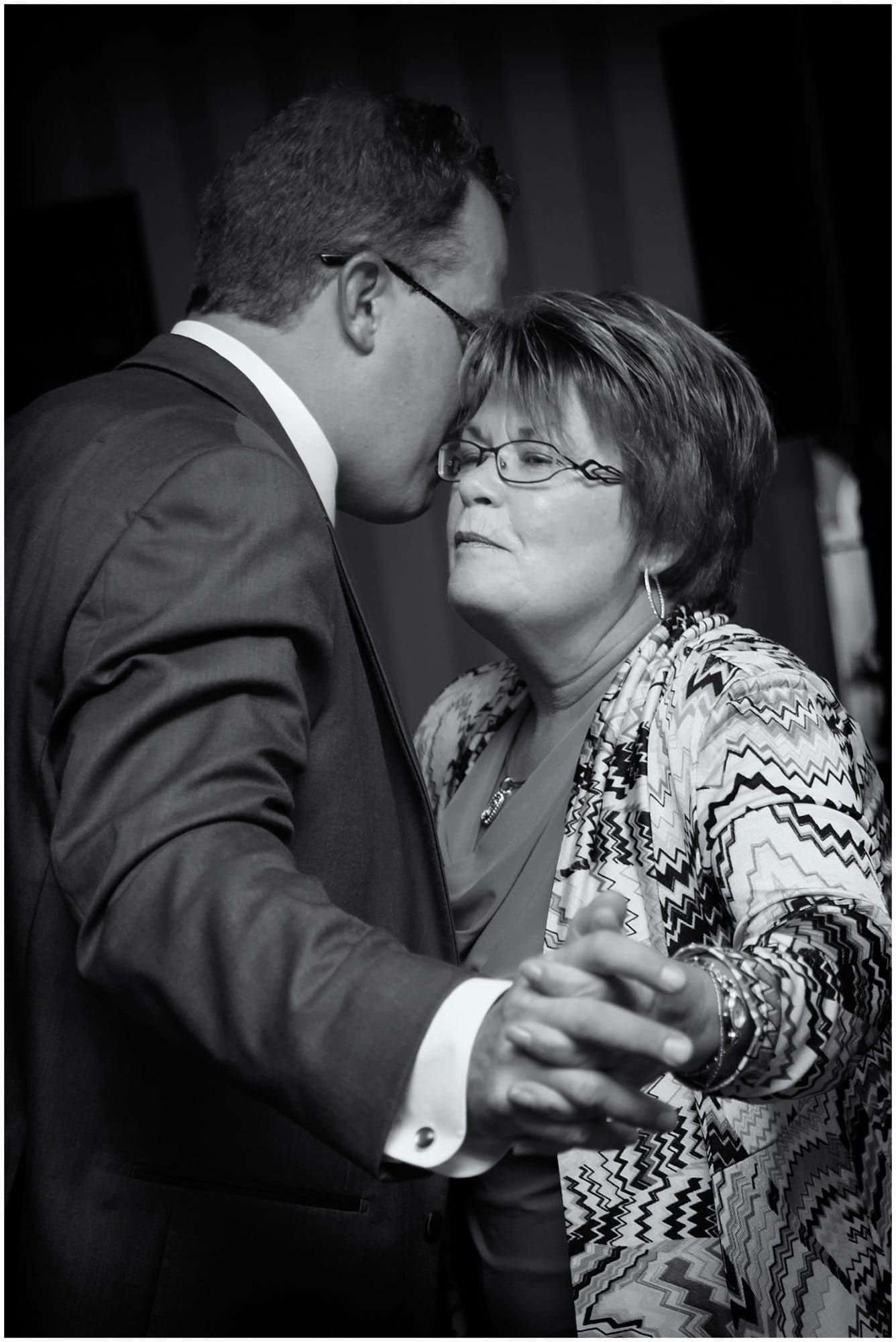 The groom dances with his mother during the parent dances at his wedding reception in the Ashburn Golf Club in Halifax.
