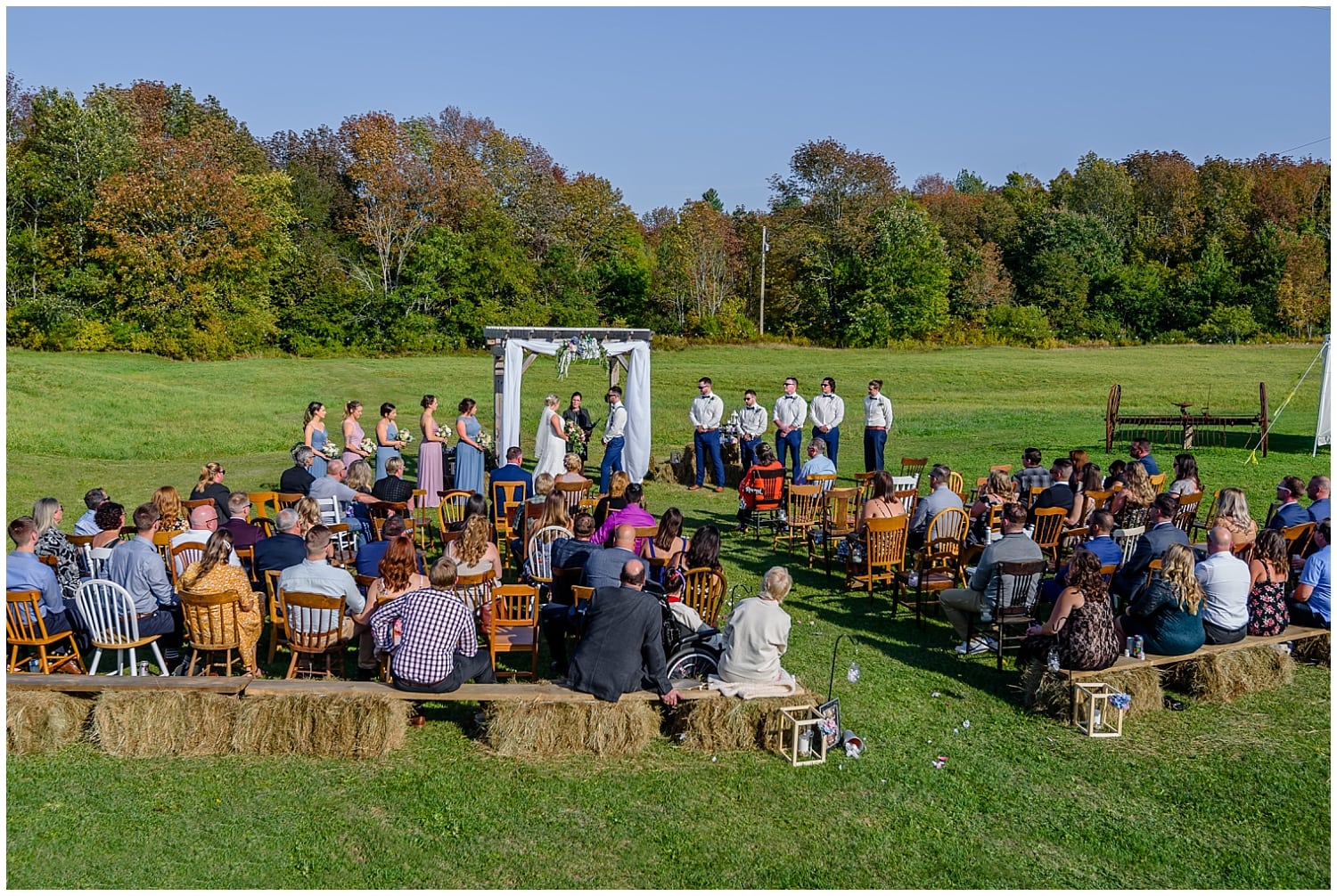 A wedding ceremony with guests at the Barn at Sadie Belle Farm in NS.