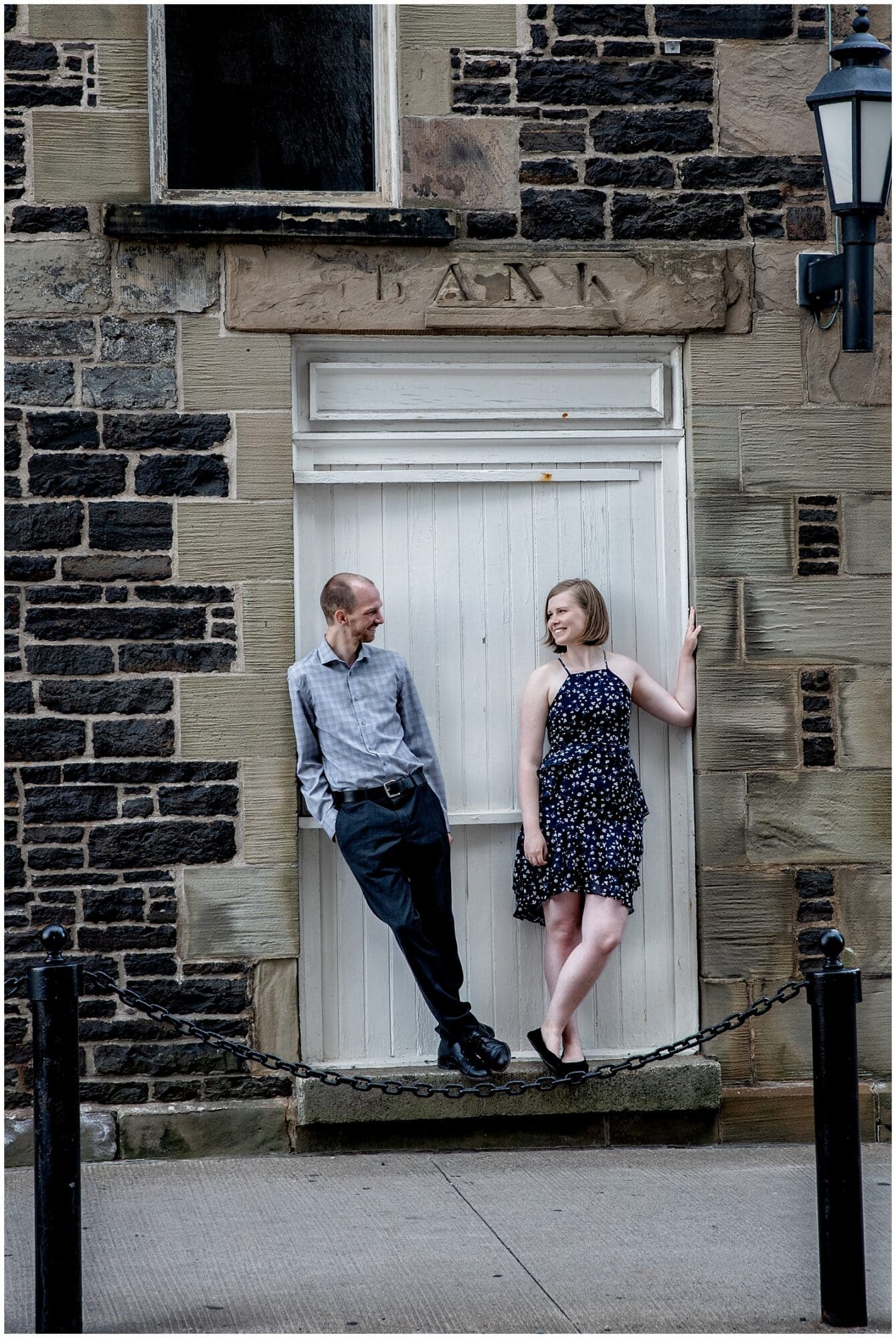 Urban feel engagement photos of a couple in love at the Historic Properties in Halifax NS.