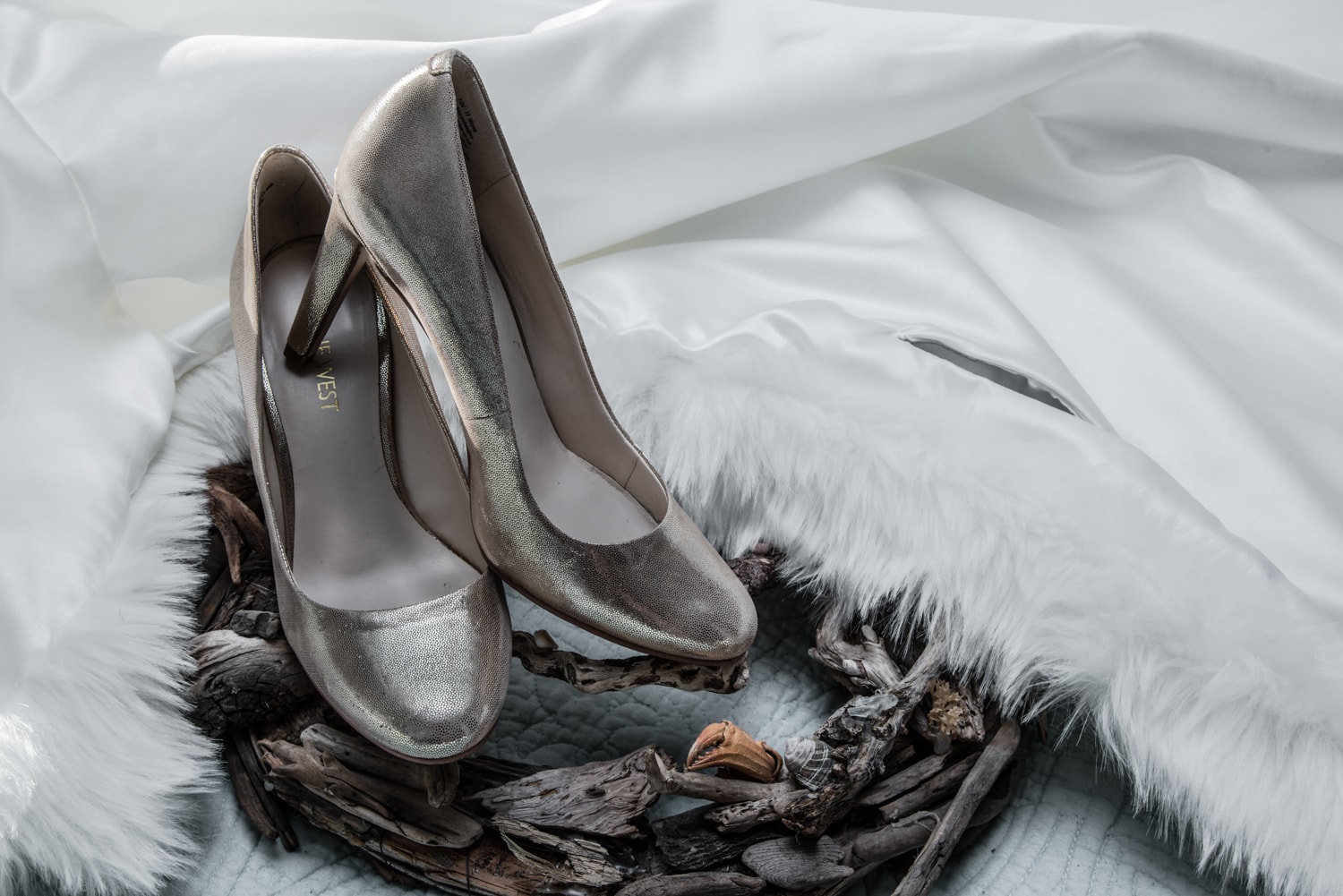 The bride's winter wedding shoes with fur cape.