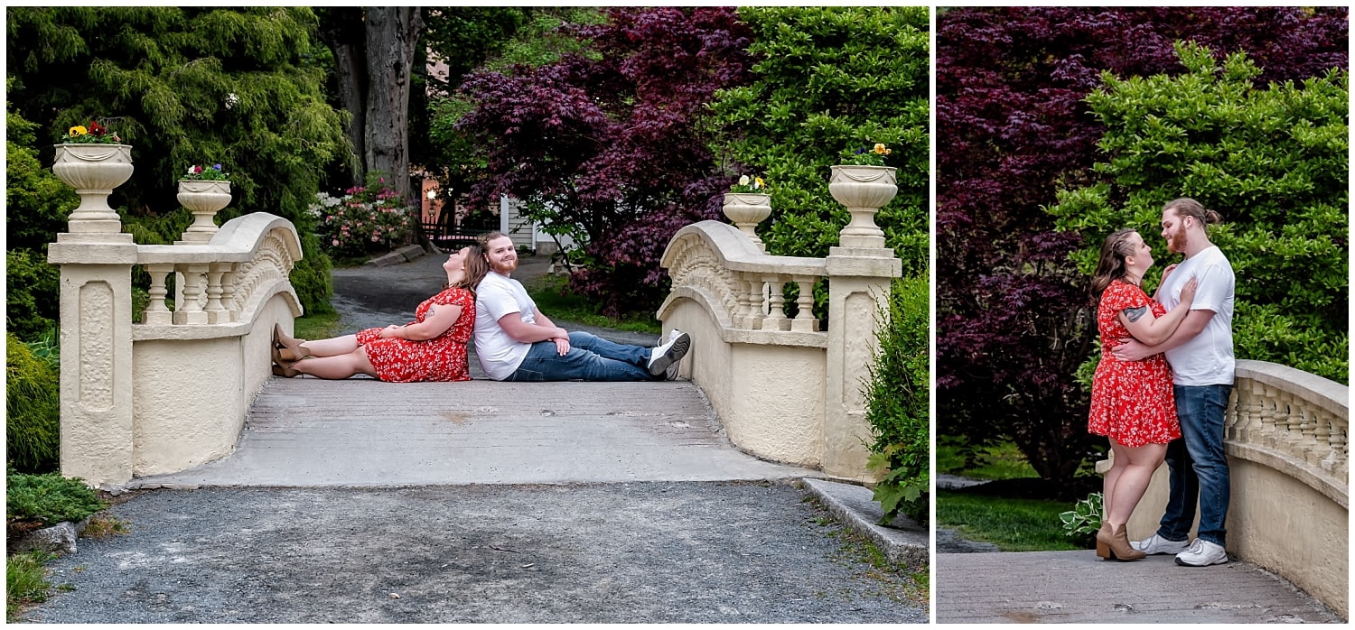 A newly engaged couple pose on a bridge for their engagement photos at the Public Gardens in Halifax.
