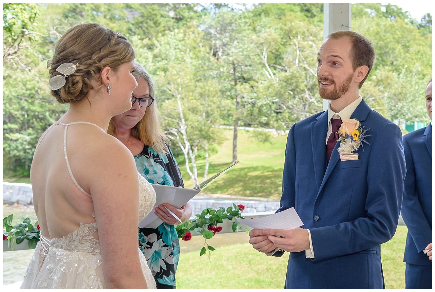 The groom says his wedding vows during his wedding ceremony in the gazebo at Sir Sandford Fleming Park in Halifax, NS.