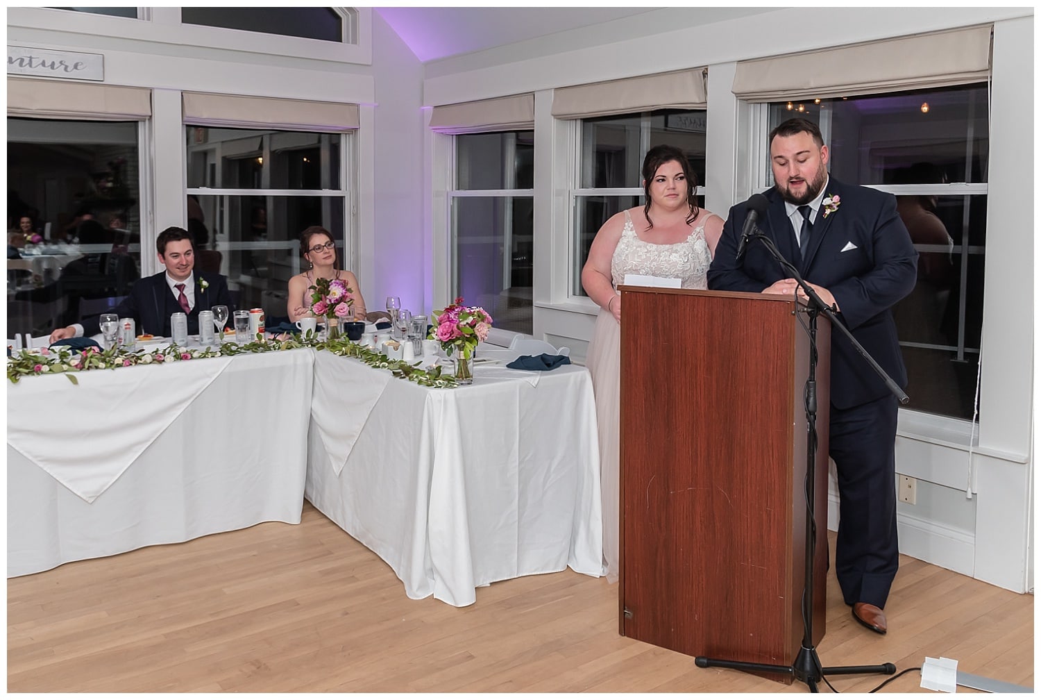 The bride and groom give their thank you speech during their wedding reception at the Oceanstone Resort in Nova Scotia.