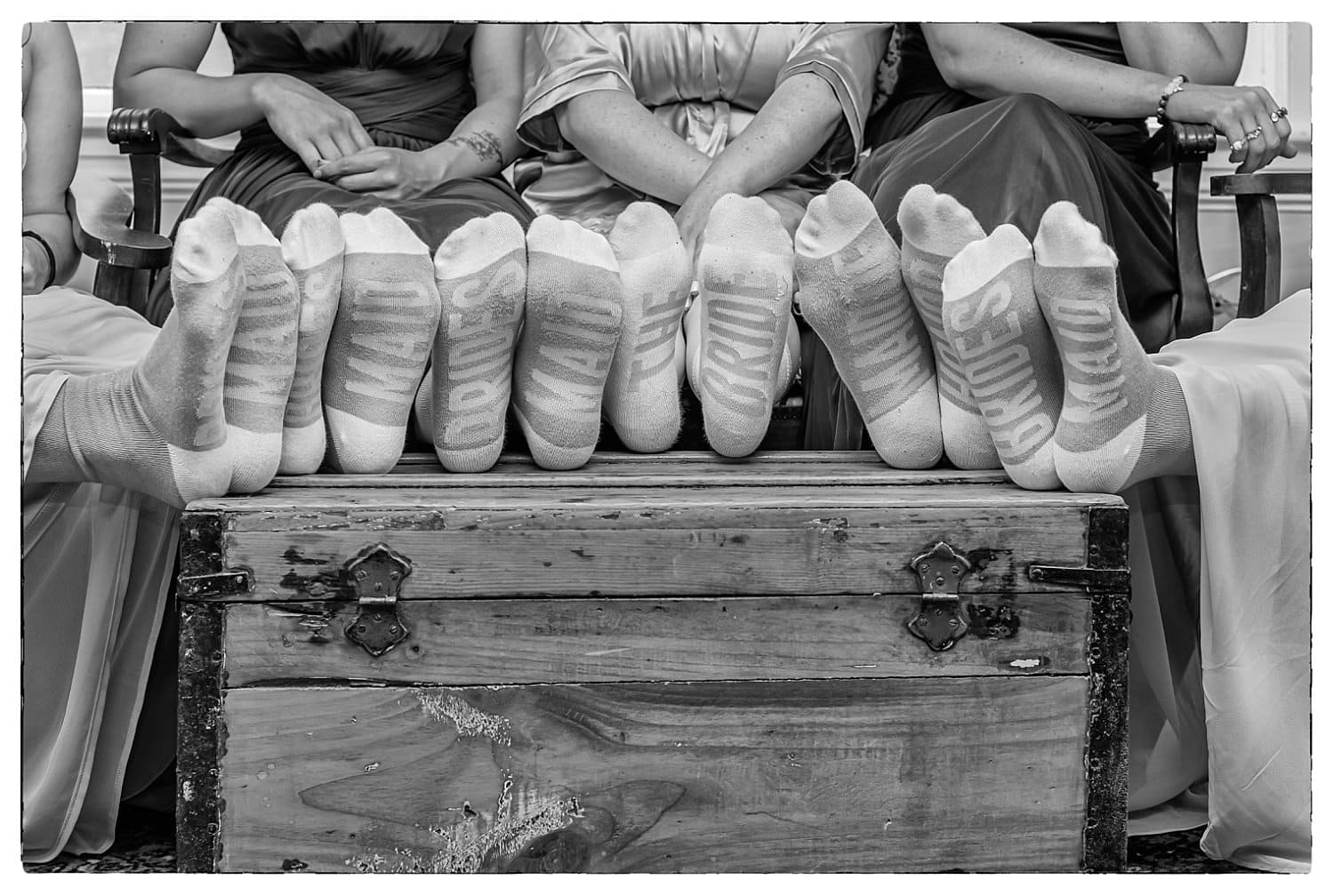 The bride and her bridesmaids where matching socks during bridal prep at the Carlisle House in Annapolis Royal NS.