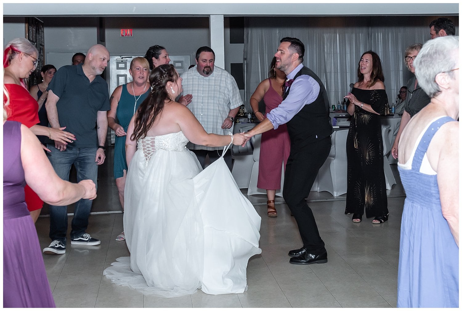 The bride and groom dance during their wedding reception.