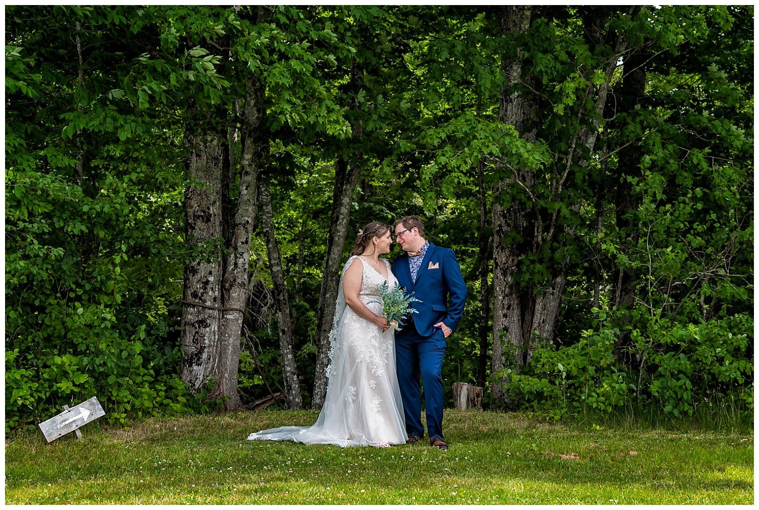 The bride and groom share a look together during their wedding photos at the Sadie Belle Farm.