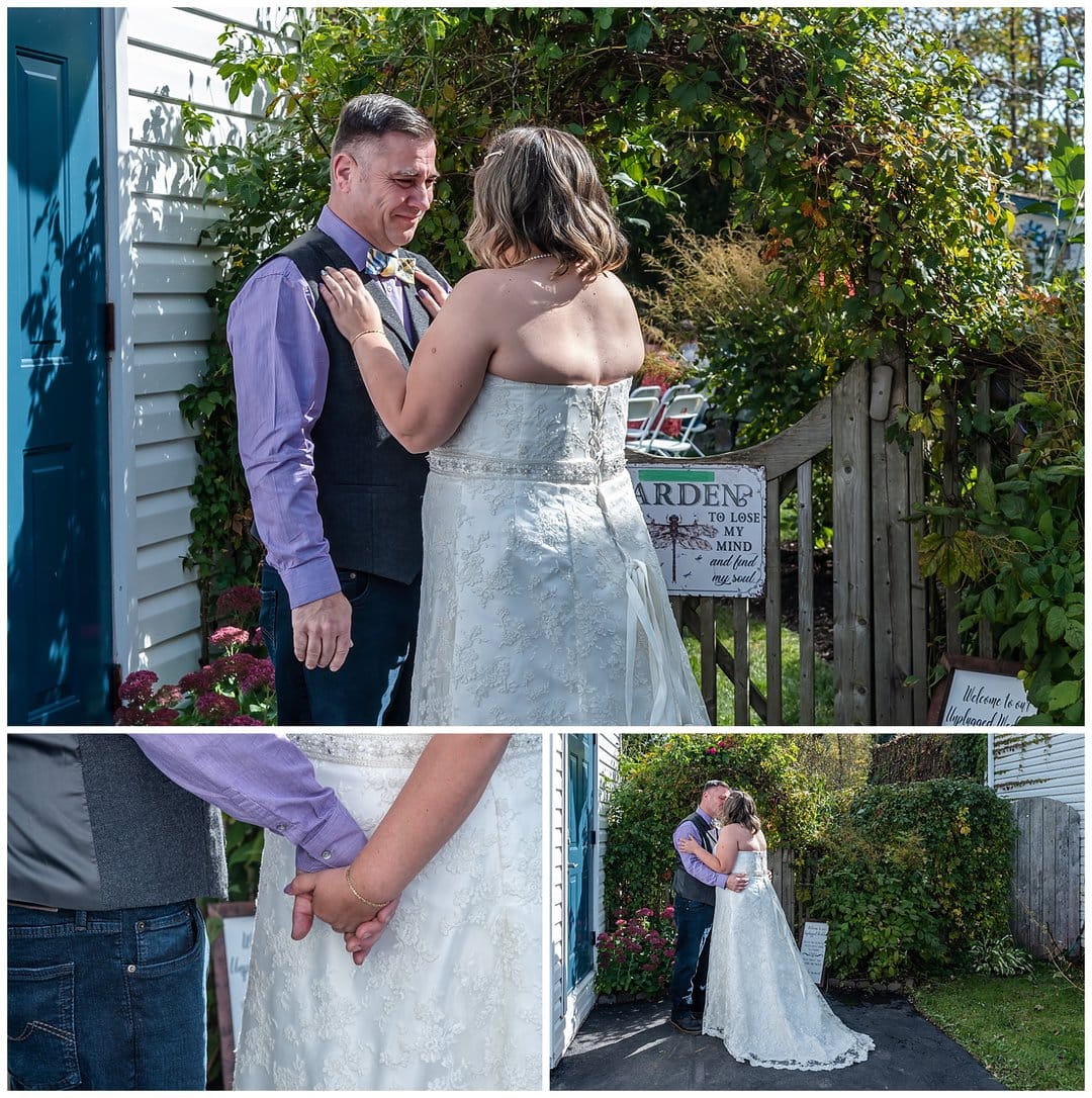 The bride and groom have their first look before their backyard garden wedding ceremony.