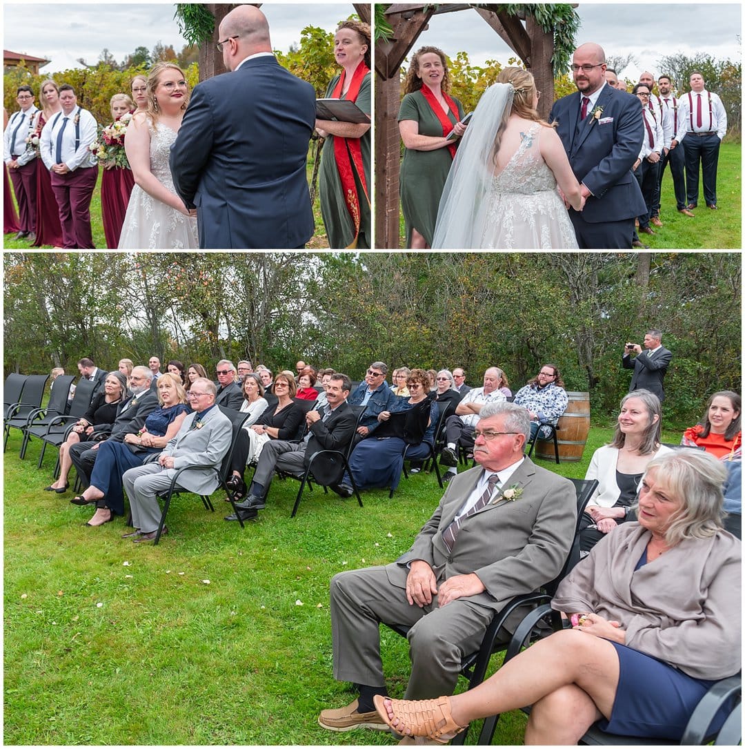 The bride and groom exchange wedding vows during their ceremony at Bent Ridge Winery in NS.
