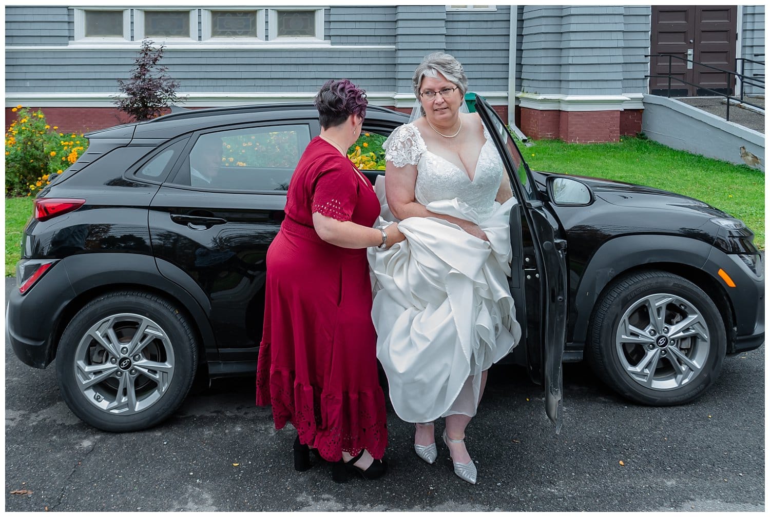 The bride and maid of honor arrive for the wedding ceremony at a church in Windsor NS.