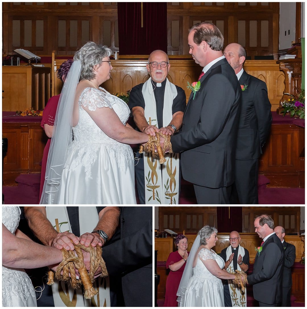 The groom and bride are bound by rope during their wedding ceremony in Windsor NS.