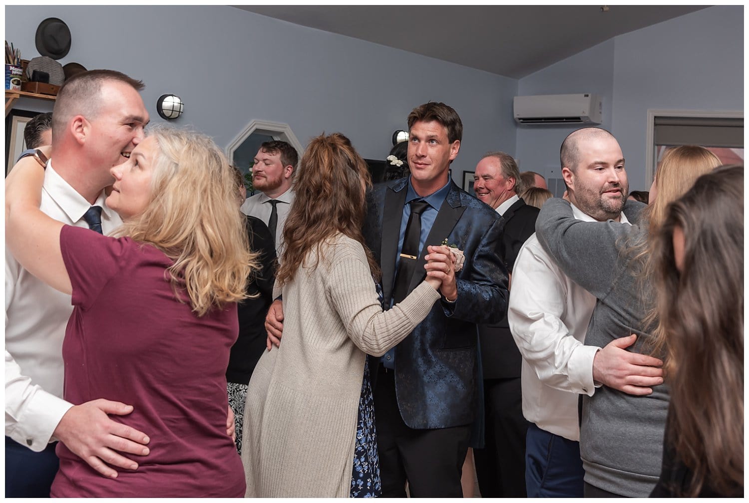 The groom dances with his mother during the wedding reception at Fishermans Cove in NS.