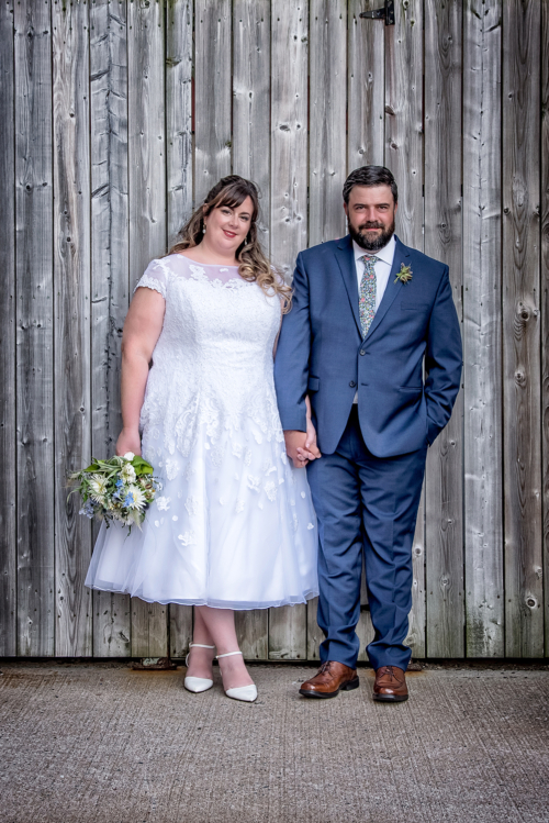 A bride and groom pose for their wedding photos at the Best Western Chocolate Lake in Halifax, NS.