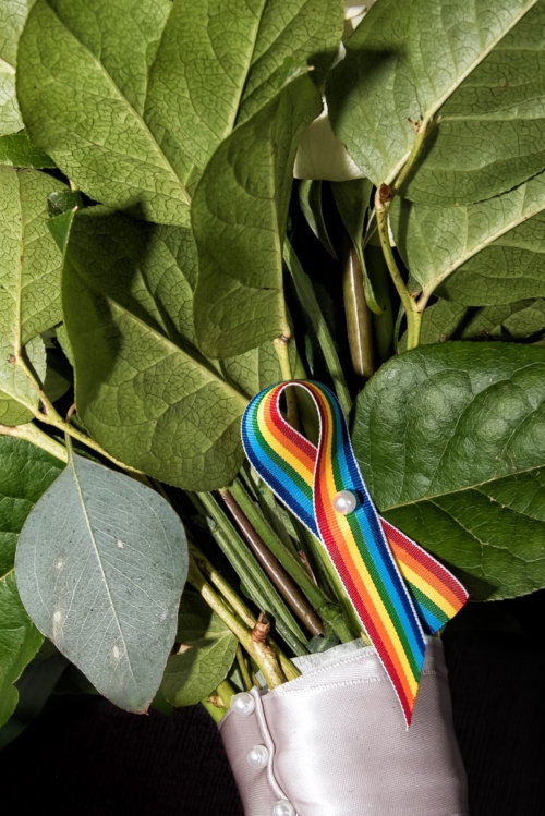 A beautiful bridal bouquet with a LGBT, gay, pride ribbon attached for a wedding in Halifax, NS.