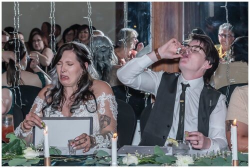 The Bride's reaction to her tequila shot is priceless during a wedding game at their reception at Saraguay House in Halifax NS.